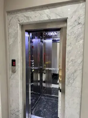 a bathroom with a glass shower in a building at Racine Studio bd Anfa in Casablanca