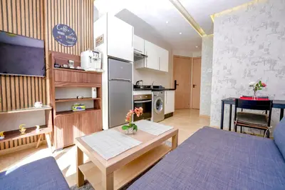 a living room with a couch and a table at Studio anfa plaza in Casablanca