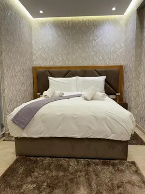 a bedroom with a bed with two towels on it at Studio anfa plaza in Casablanca