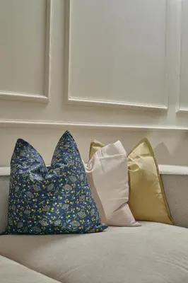 two pillows sitting on top of a bed at YourPlace Rabat - Royal Residence in Rabat