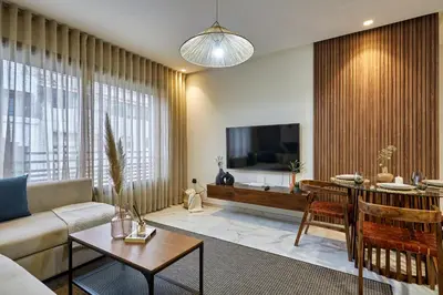 a living room with a couch and a table at Charming 1 Bed Casablanca Retreat With Free Parking in Casablanca
