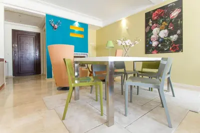 a dining room with a table and chairs at Luxurious apartment, European Quality in Casablanca