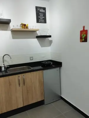 a kitchen with a sink and a counter top at Mohammedia Relax in Mohammedia