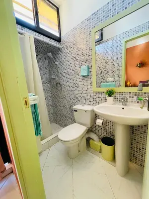 a bathroom with a toilet and a sink at Beautiful Studio in the heart of Casablanca in Casablanca