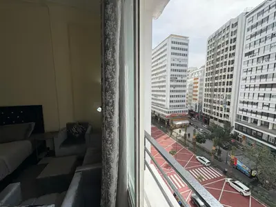 a view of a city street from a window at Casablanca Central Suites - Casa Port in Casablanca
