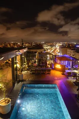 a pool on the roof of a building at night at Courtyard by Marriott Casablanca Downtown in Casablanca