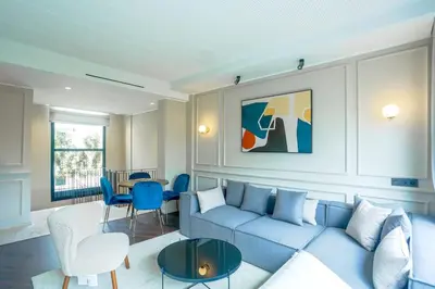 a living room with a couch and a table at Résidence Jade in Casablanca