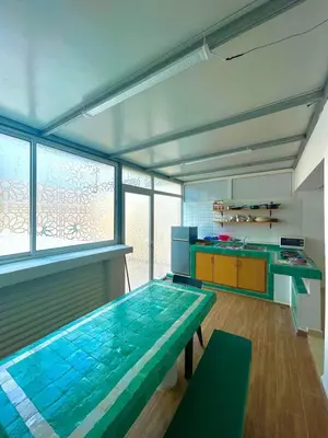 a kitchen with a large pool in the middle of a room at New Luxurious apartment Agdal Rabat center in Rabat