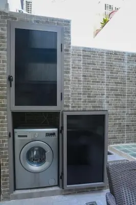 a washing machine and a dryer in a building at Résidence Sheren - Maarif in Casablanca