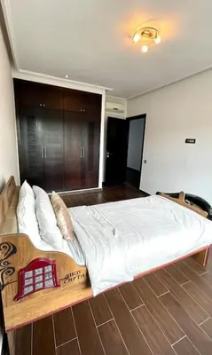 a bedroom with a large bed in a room at Luxury villa with private pool in Casablanca