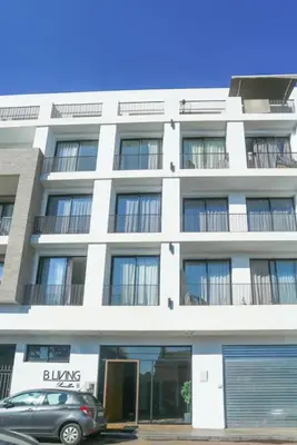 a building with a car parked in front of it at #23 New Charming Casablanca Retreat/keyless door in Casablanca