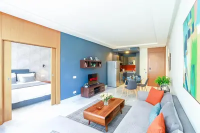 a living room with a couch and a bed at #23 New Charming Casablanca Retreat/keyless door in Casablanca