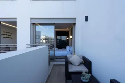 a view from the balcony of a house at Charming & Airy Flat - Perfect for Relaxation in Casablanca