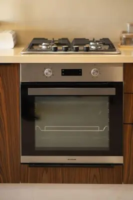a stove top oven sitting on top of a counter at Charming & Airy Flat - Perfect for Relaxation in Casablanca
