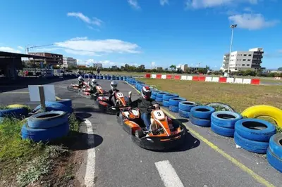a row of motorcycles parked in a parking lot with blue tires at Best appartement pools view at Mansouria in Mohammedia