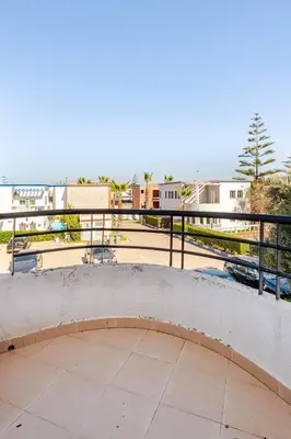 a view from the balcony of a building at 4 min à pied de la Plage, 3 BR, Piscine, Parking in Skhirat