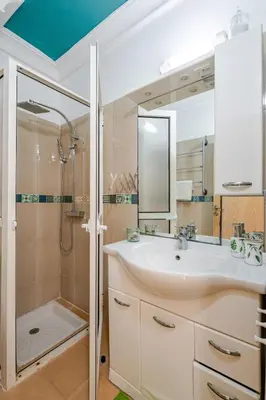 a bathroom with a sink and a shower at 4 min à pied de la Plage, 3 BR, Piscine, Parking in Skhirat