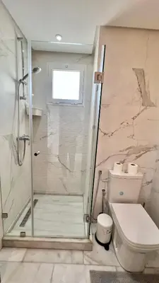 a bathroom with a shower and a toilet at N9 Appartement pied sur mer, La Corniche Rabat in Rabat