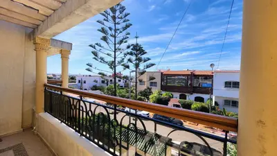 a balcony with a view of a city at Spacious Harhoura Villa: Perfect for Families (5min to Beach) in El Harhoura