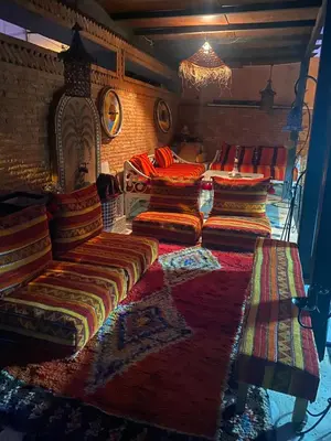 a room with a bunch of beds in a room at Appartement oulfa in Casablanca