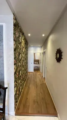a hallway with a floral mural on the wall at Modern rez de villa, jack beach Tamaris, Dar Bouaza in Casablanca