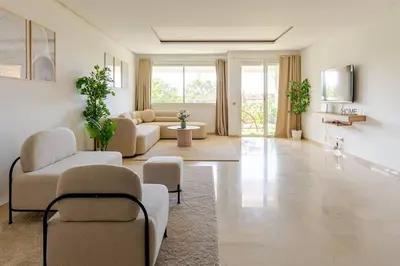 a large living room with couches and chairs at TT Holidays Hay Riad Prestigia in Rabat