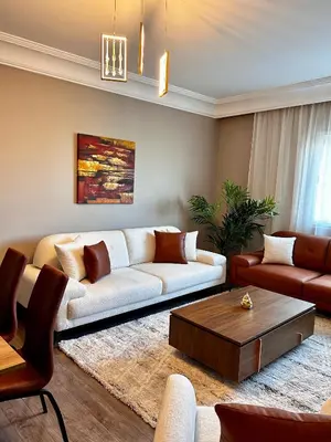 a living room with a couch and a coffee table at 3 minutes de casa voyageurs in Casablanca