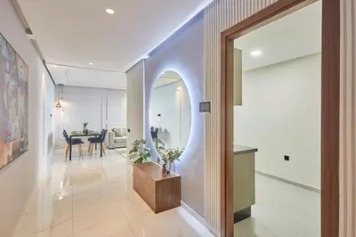 a hallway with a dining room and a dining table at Modern Elegance 3 Bed Escape in Trendy Casablanca in Casablanca