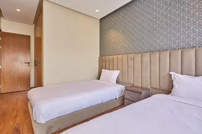 two beds in a room with two beds sidx sidx sidx at Discover Casablanca Stay in our 3-Bed Gem with Parking in Casablanca