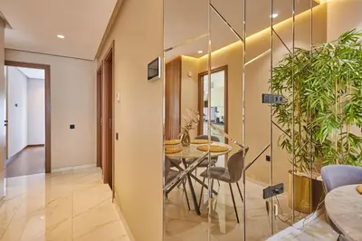 a dining room with a table and some plants at Discover Casablanca Stay in our 3-Bed Gem with Parking in Casablanca