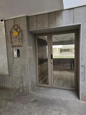 an entrance to a building with a glass door at MIA Appartement N1 - Élégance, Confort et Sérénité in Casablanca