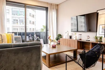 a living room with a couch and a table at Cozy Luxurious Bourgogne Studio in Casablanca