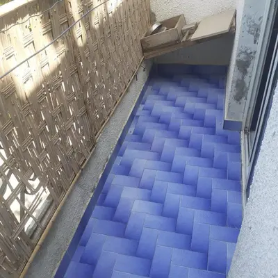 a floor covered in blue tiles in a room at Captivating 4-Bed House in Tamaris in Tamaris