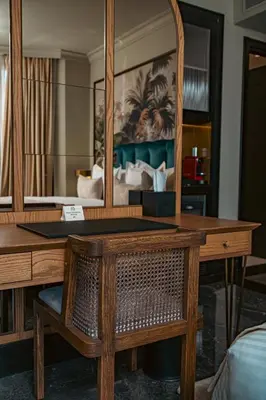 a desk with a mirror in a room at Marly Boutique Hôtel in Casablanca