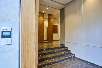 a hallway with stairs leading into a building at Luxurious apartment in the heart of Maarif Casa in Casablanca