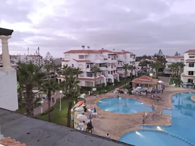 an aerial view of a resort with a swimming pool at Garden Beach 2 sidi rahal in Sidi Rahal