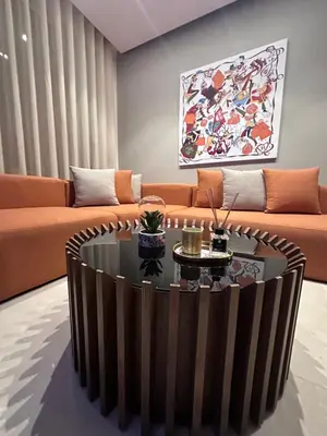 a living room with a couch and a coffee table at CFC Luxury View Appt Anfa park in Casablanca