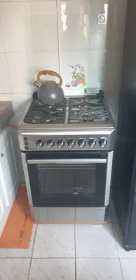 a stove with a pot sitting on top of it at إقامة الياسمين in Rabat