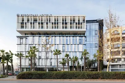 a building with a sign on the side of it at Eurostars Casa Anfa in Casablanca