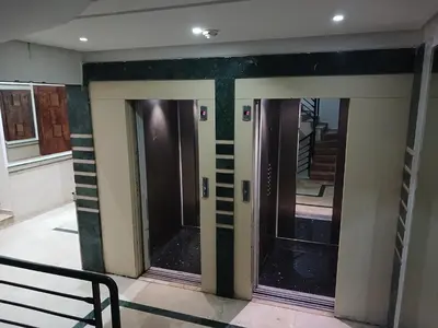 a hallway with two doors in a building at Boulevard Anfa in Casablanca