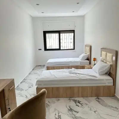Chambre à Agdal Rabat dans un appartement partagé -two single beds-
