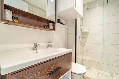 a bathroom with a sink and a shower at AeroStudio in Nouaceur