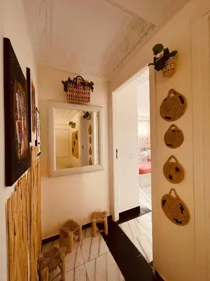 a room with a hallway with a door and a mirror at Enchanting Studio in Casablanca in Casablanca
