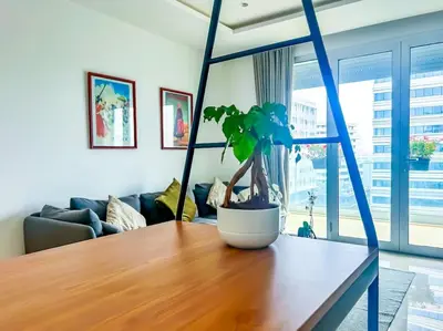 a potted plant sitting on a table in a living room at Appartement prestige vue dégagée in Casablanca