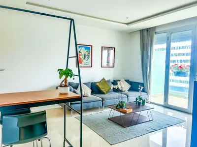 a living room with a couch and a table at Appartement prestige vue dégagée in Casablanca