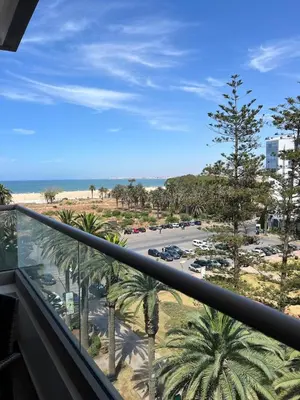 a balcony with a view of a parking lot at Le Joyau du Parc in Mohammedia