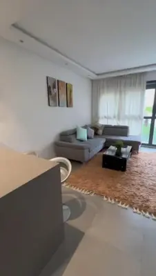 a living room with a couch and a table at Jasmine's house in Casablanca