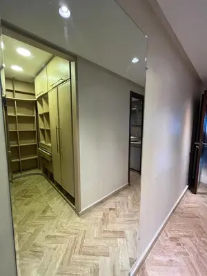an empty walk in closet with a large mirror at Elégance et confort au coeur de Casablanca in Casablanca