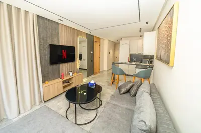 a living room with a couch and a table at Twenty Four Inn 306 in Casablanca