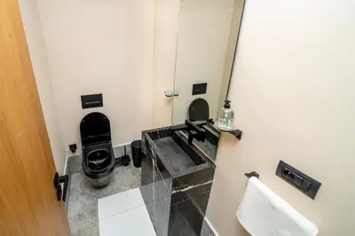 a bathroom with a toilet and a sink at Twenty Four Inn 304 in Casablanca